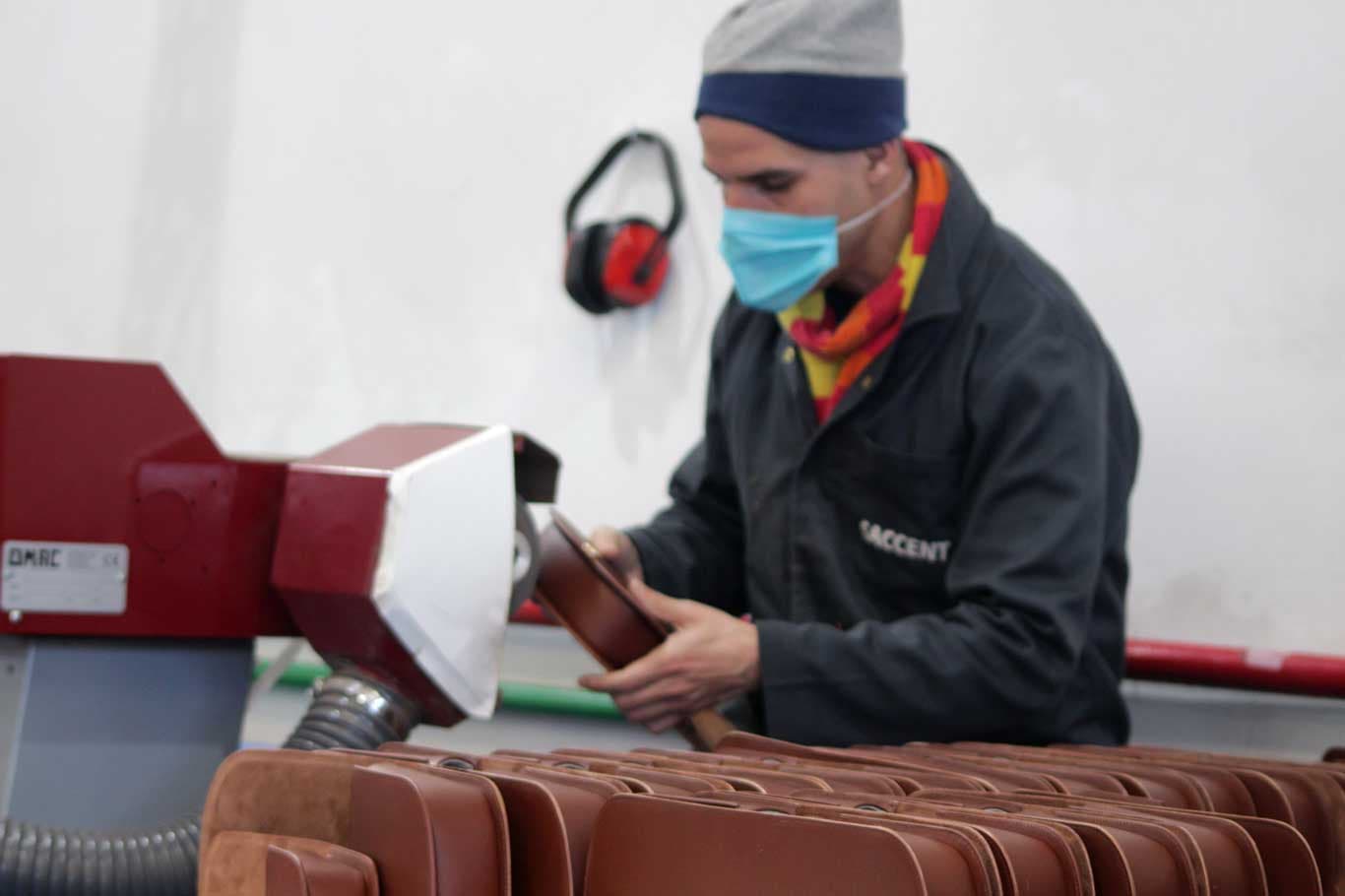 Leather panels edge-finished in batches at the Saccent workshop in Fes, Morocco