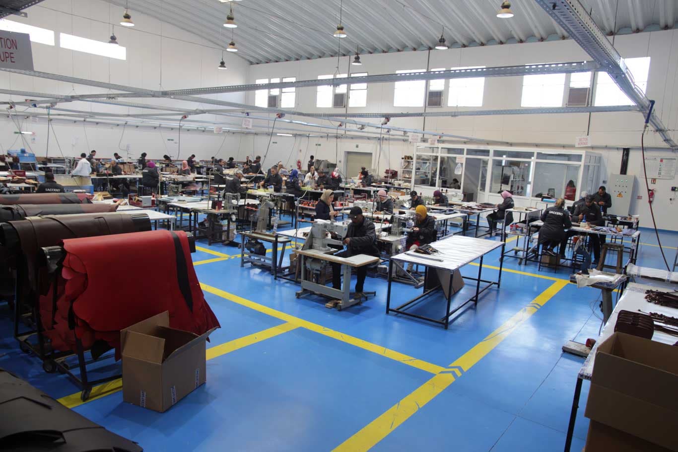 Stitching hall at the Saccent leather goods factory in Fes, Morocco