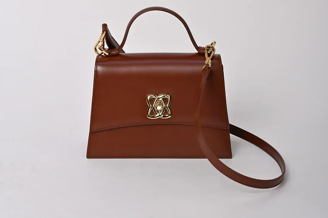 Von baer city business leather laptop bag brown on the table in the president suite slider